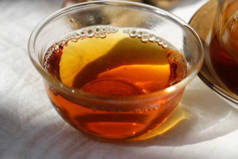 black tea in a small glass cup